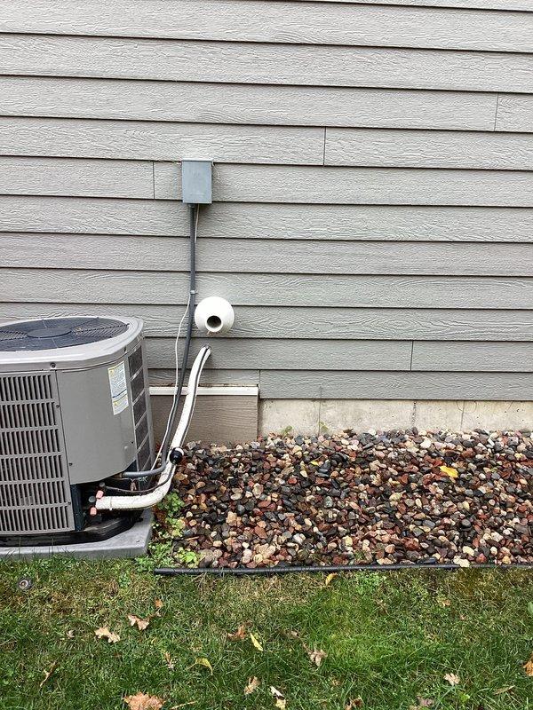 Diagnosed 80-gallon electric water heater leaking from the bottom due to tank rupture. Informed customer the unit requires complete replacement and advised that residential units in this size have been phased out. Recommended heat pump water heater as an alternative with available tax credit ending this year. Customer will contact us with decision after consulting with spouse.