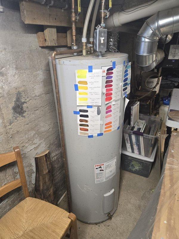 Responded to call regarding no hot water. Diagnosed and replaced failed zone valve for boiler system. Found system water level critically low, refilled to proper operating level. Cycled system to confirm proper operation, verified hot water restoration, and noted quieter system operation after service.