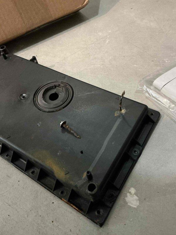 Replaced collector box on 7-year-old furnace after identifying the source of the leak was behind a severely corroded draft motor screw. The corroded screw broke during removal, requiring installation of a replacement screw. System now operating properly with no leaks.