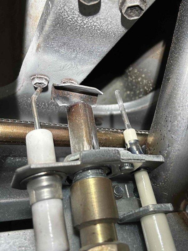 Performed preventative maintenance on dual furnace system. Conducted tune-up on both units - Goodman furnace showing delayed spark igniter function with 60-second spark delay, and Ruud furnace exhibiting initial startup issues. Resolved immediate concerns by cleaning flame sensors on both units, which restored proper ignition on the Ruud. Recommended replacement of faulty spark igniter on the Goodman furnace to prevent future heating interruptions.