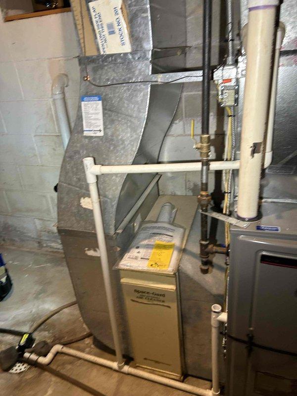 Performed preventative maintenance on dual furnace system. Conducted tune-up on both units - Goodman furnace showing delayed spark igniter function with 60-second spark delay, and Ruud furnace exhibiting initial startup issues. Resolved immediate concerns by cleaning flame sensors on both units, which restored proper ignition on the Ruud. Recommended replacement of faulty spark igniter on the Goodman furnace to prevent future heating interruptions.