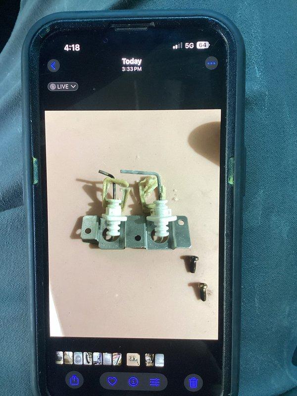 Diagnosed boiler malfunction where unit would fire up with only partial burner lighting, then shut down with ignition error code. Inspection revealed completely disintegrated flame sensor gaskets and a missing heat exchanger screw causing combusted gas to escape. Identified secondary issue with vibrating inducer motor. Removed flame sensors for inspection and advised customer that replacement sensors would be needed immediately, with possible full system replacement recommended due to 15-year system age. Diagnosed boiler malfunction where unit would fire up with only partial burner lighting, then shut down with ignition error code. Inspection revealed completely disintegrated flame sensor gaskets and a missing heat exchanger screw causing combusted gas to escape. Identified secondary issue with vibrating inducer motor. Removed flame sensors for inspection and advised customer that replacement sensors would be needed immediately, with possible full system replacement recommended due to 15-year system age.