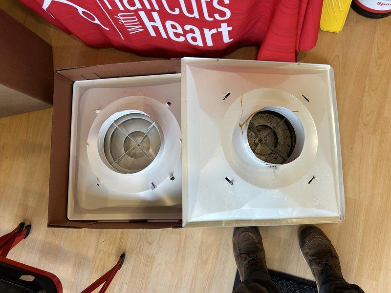 Assessed and documented six rusted ceiling registers requiring replacement in 20-foot high ceilings. Customer supplied four registers but had ordered incorrect size; confirmed measurements of existing circular vents (approximately 9-10 inches diameter). Initiated parts order for two additional correctly-sized 2'x2' white ceiling registers after determining both customer-supplied and our initial replacement units were incorrectly sized.