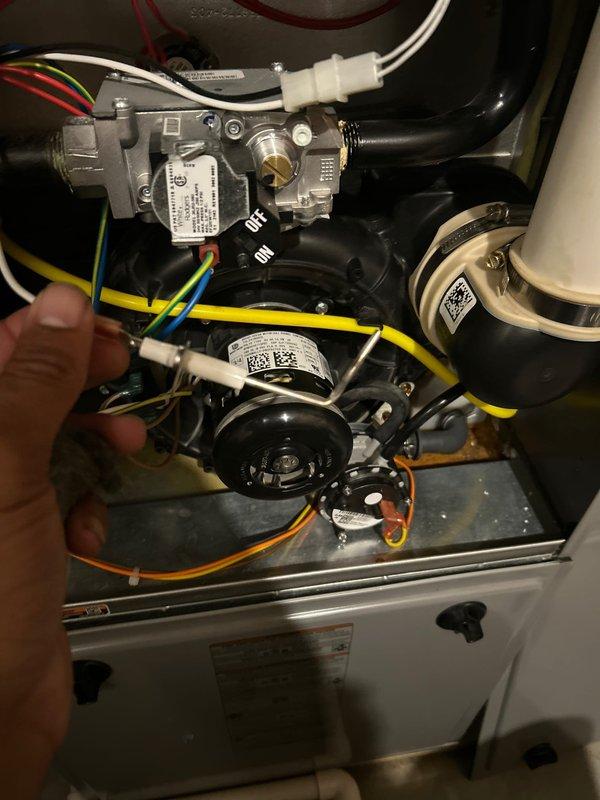 Diagnosed noisy furnace caused by faulty exhaust system; replaced exhaust components and secured proper venting. Performed comprehensive maintenance including cleaning flame sensor and verifying gas pressure. System is now operating correctly with clean combustion and no loud noises.