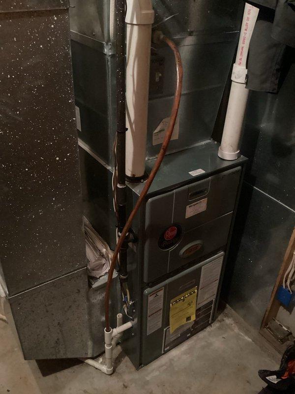 Performed comprehensive furnace tune-up on aging 10-15 year old unit. Replaced customer-supplied dirty filter, verified blower was clean and balanced. Discovered inducer motor producing excessive noise with capacitor out of specification. Completed full electrical component inspection with remaining components within normal parameters. Heat exchanger inspection revealed no compromises but identified areas of concern which were discussed with customer. System testing confirmed proper operation with appropriate gas pressures and 50-degree temperature rise in low setting. Provided recommendations for both repairs and replacement options given the unit's age and condition. Performed comprehensive furnace tune-up on aging 10-15 year old unit. Replaced customer-supplied dirty filter, verified blower was clean and balanced. Discovered inducer motor producing excessive noise with capacitor out of specification. Completed full electrical component inspection with remaining components within normal parameters. Heat exchanger inspection revealed no compromises but identified areas of concern which were discussed with customer. System testing confirmed proper operation with appropriate gas pressures and 50-degree temperature rise in low setting. Provided recommendations for both repairs and replacement options given the unit's age and condition.