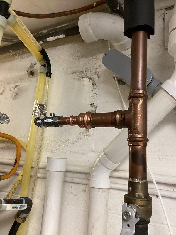 Successfully installed a new 1/4" water line for the customer's humidifier system, including the installation of a 1/4" shutoff valve. Connected the copper supply line to the existing 1" water line and properly secured all fittings to ensure leak-free operation, while coordinating with the HVAC installers who were completing their portion of the project simultaneously.