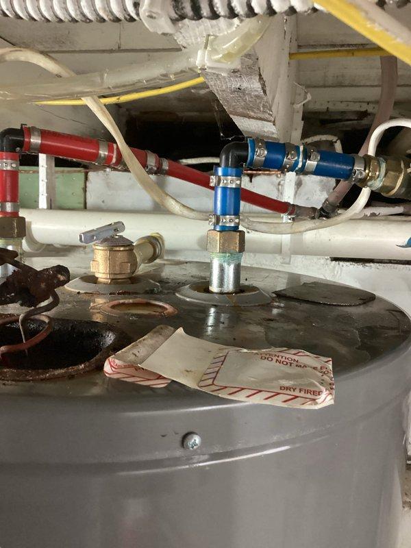 Responded to emergency service call for a 3-year-old, 50-gallon electric water heater with reported electrical burning smell and crackling noises. Upon inspection, identified severely corroded components and melted electrical wiring in the upper compartment. Power was confirmed disconnected for safety. Provided customer with replacement options; awaiting customer decision for installation of new unit. Responded to emergency service call for a 3-year-old, 50-gallon electric water heater with reported electrical burning smell and crackling noises. Upon inspection, identified severely corroded components and melted electrical wiring in the upper compartment. Power was confirmed disconnected for safety. Provided customer with replacement options; awaiting customer decision for installation of new unit.