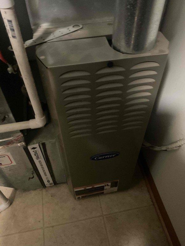 Performed comprehensive service on 15-year-old HVAC system with no cooling issue. Diagnosed and replaced failing inducer motor, changed dirty filter, and conducted combustion analysis revealing 81.8% efficiency with 42ppm CO. Noted Ecobee thermostat intermittent shutdown problem requiring attention. System's advanced age indicates potential need for full replacement.