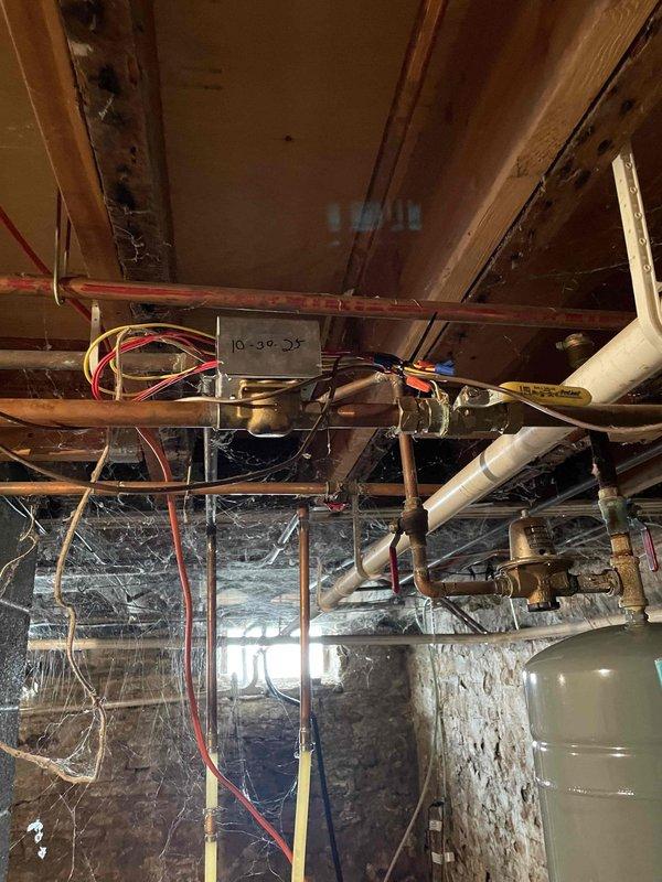 Completed a 2-hour repair service involving the replacement of an AMTROL expansion tank and rebuild of a zone valve in customer's basement heating system. After installation, system was properly bled of air and tested for proper circulation. Both zones now functioning correctly with heat distribution verified throughout.