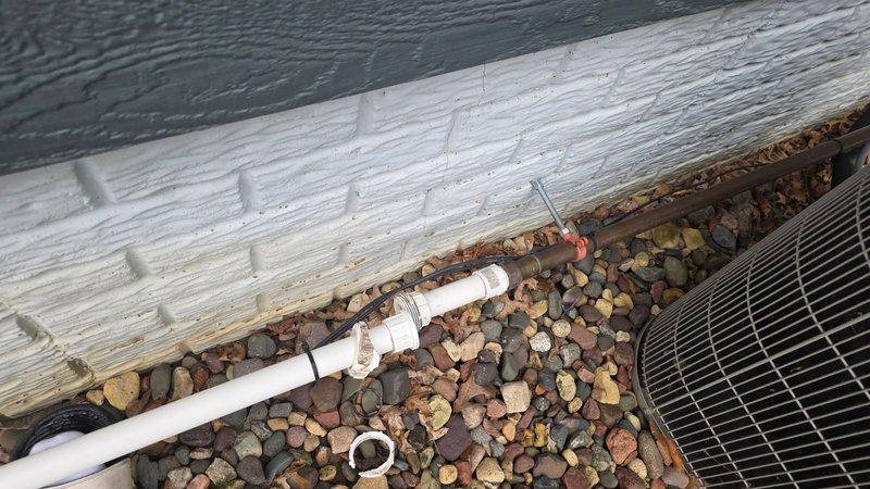 Responded to service call for irrigation system repair where a PVC union had broken due to pipe shifting over time. Upon inspection, located the damaged section of the irrigation line against the building's exterior wall. Repaired the broken connection by replacing the damaged union and realigning the PVC pipes to ensure proper alignment and prevent future stress on the joints. Tested the system after repair to confirm water flow was restored and no leaks were present.
