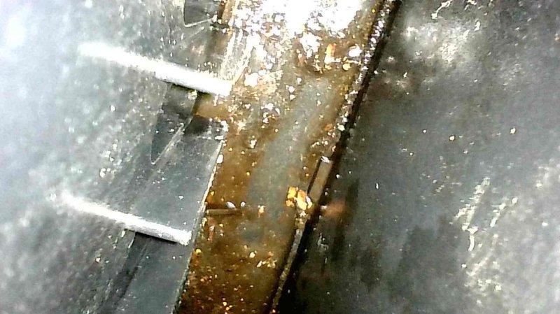 Installed variable speed combustion inducer assembly on customer's furnace. During installation, discovered signs of deterioration in the secondary heat exchanger with buildup in the collector box. Visual inspection confirmed no external pinholes, but internal degradation is evident in early stages as documented in photos showing moisture accumulation and significant corrosion on metal components. Advised homeowner of findings and discussed options for future furnace replacement while maintaining current heating capabilities. Installed variable speed combustion inducer assembly on customer's furnace. During installation, discovered signs of deterioration in the secondary heat exchanger with buildup in the collector box. Visual inspection confirmed no external pinholes, but internal degradation is evident in early stages as documented in photos showing moisture accumulation and significant corrosion on metal components. Advised homeowner of findings and discussed options for future furnace replacement while maintaining current heating capabilities.