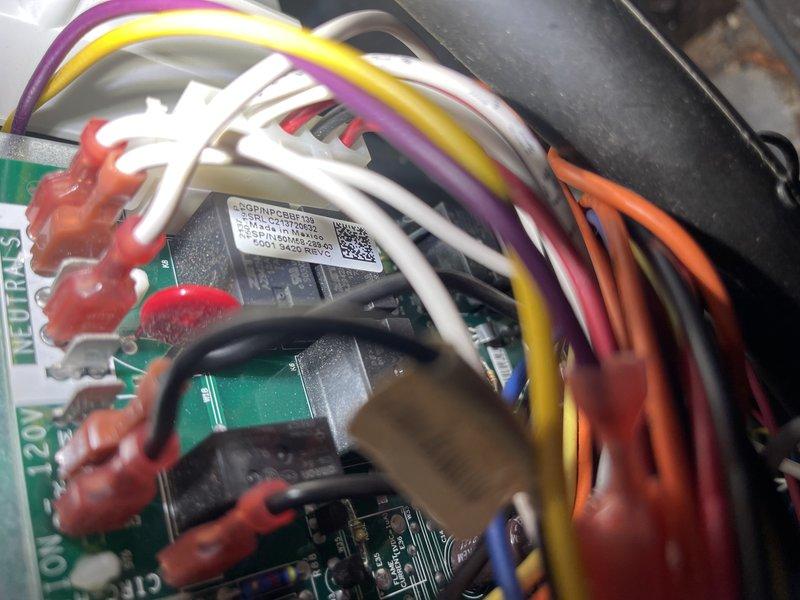 Responded to intermittent no-heat call with system locking out on 12-flash code (igniter relay failure) after 10-15 minutes of operation. Investigated system that was short cycling and failing to light. Increased fan speed and temporarily removed filter which improved operation. Inspected heat exchanger and identified cracked AC drain pan. Advised customer that control board replacement may be necessary if issue persists and provided estimate.