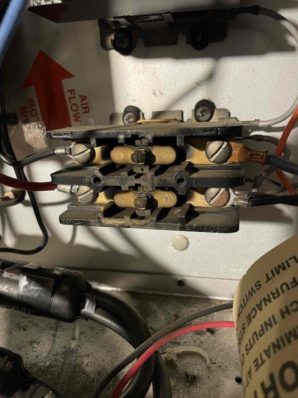 Responded to no-heat complaint on dual electric/oil furnace system. Diagnosed failed electric plenum heater with burnt contactors and 24V coils as confirmed by visual inspection. Customer has been relying on oil furnace for heat. After discussing repair options, customer elected to discontinue electric heating repairs in favor of converting to LP due to high utility costs from electric heat usage. Scheduled advisor visit for LP conversion consultation.