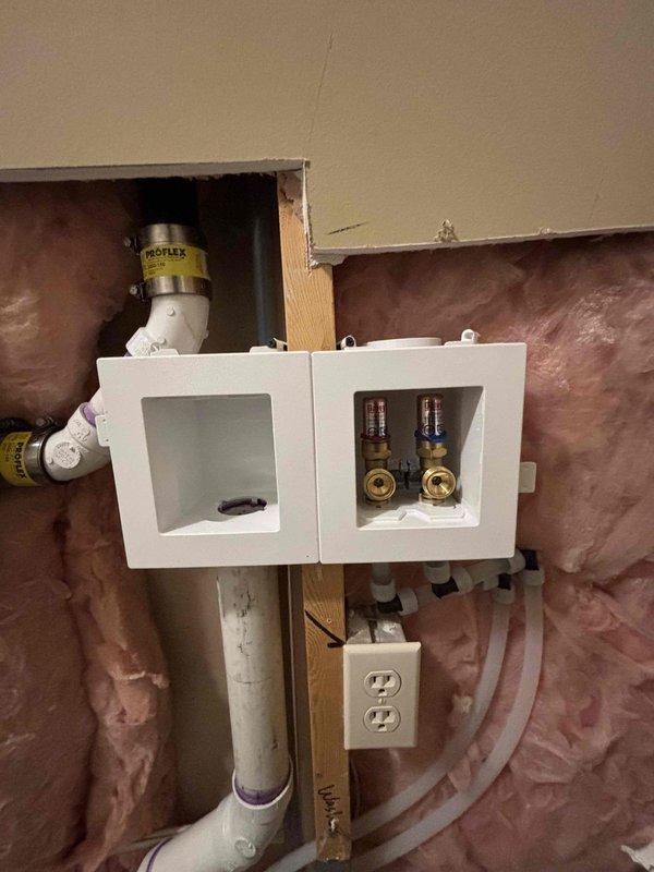 Relocated existing laundry box plumbing assembly without wall demolition. Successfully installed and connected water supply lines with new shutoff valves and properly positioned drain line, ensuring proper functionality with clean installation in wall cavity. System tested and confirmed operational with no leaks.
