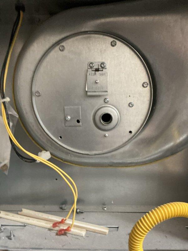 Responded to a no-heat call for a 5-year-old Revolve mobile home furnace. Diagnostic testing revealed the furnace was attempting to ignite but failing. Inspection identified a broken igniter wire that had detached at the base of the igniter. Replaced the failed igniter component and verified proper system operation. Unit is now functioning correctly with normal heat output.