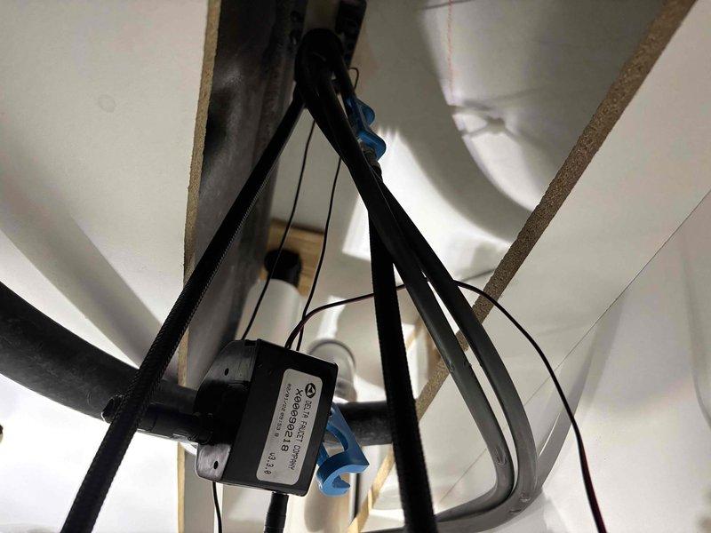 Diagnosed low water pressure in kitchen and lavatory touch faucets. Identified failed solenoid valves as root cause. Documented issue with photos of the electronic components. Obtained Delta warranty replacement parts for future installation.