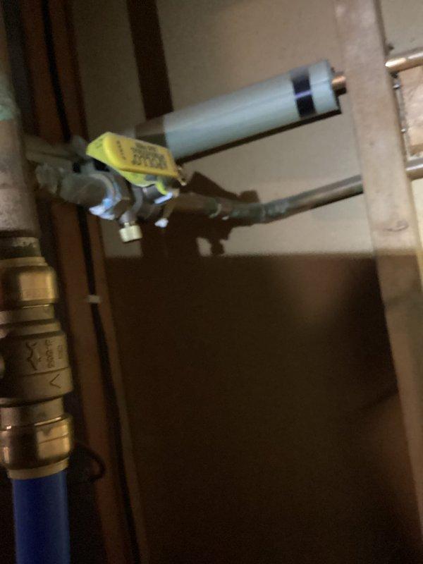 Assessed customer's non-functional water treatment system and documented existing issues, including a leak behind the gas valve on water heater and faulty shut-off valve. Customer is awaiting third-party estimate before proceeding with replacement options previously presented.