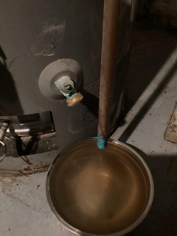 Responded to low water pressure complaint throughout residence. Located source of issue at water heater drain port where cap was leaking. Installed new drain port cap to restore proper system pressure and prevent further water loss.