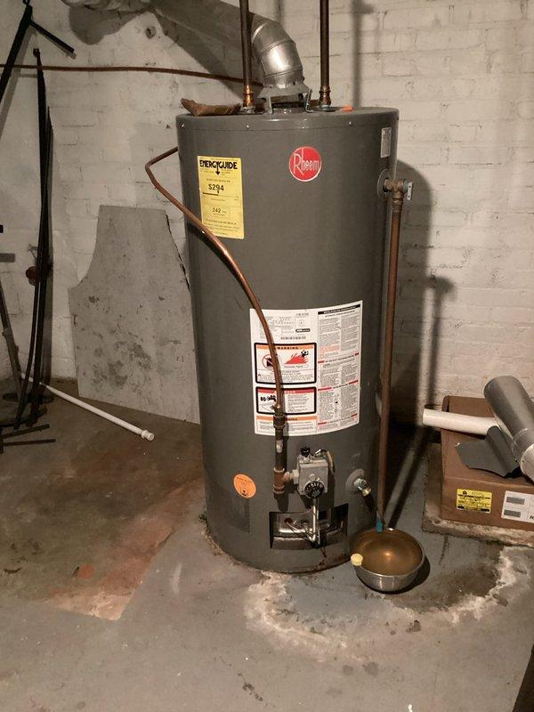 Responded to low water pressure complaint throughout residence. Located source of issue at water heater drain port where cap was leaking. Installed new drain port cap to restore proper system pressure and prevent further water loss.