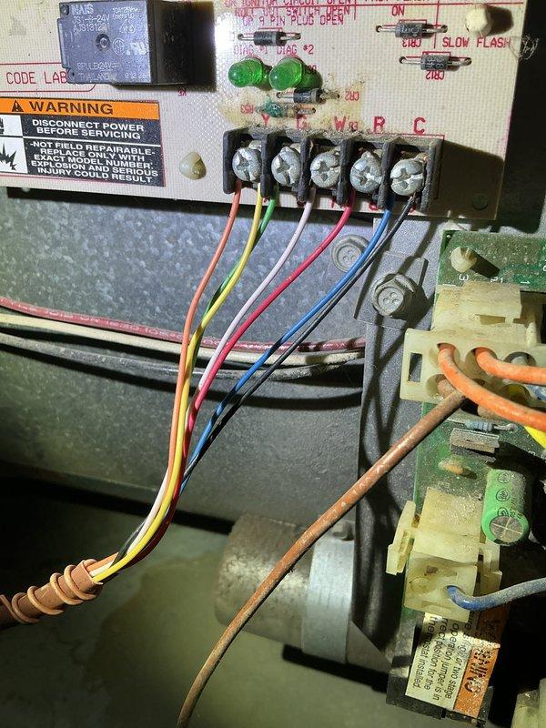 Diagnosed 25-year-old Lennox furnace with no heat condition. Discovered dual control board failures causing system errors including main power reversed and pressure switch opening during startup. Recommended complete replacement of both control boards or full system replacement due to advanced equipment age and component deterioration evidenced by soot accumulation.