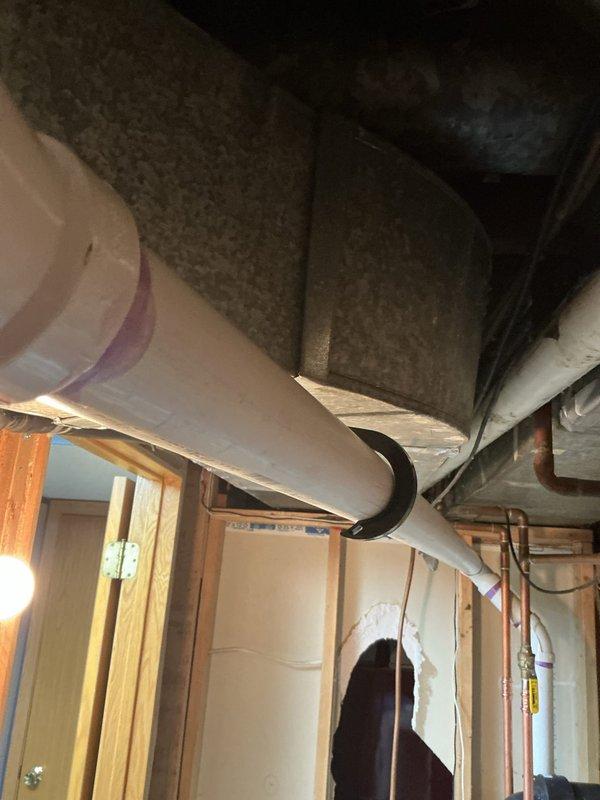 Replaced leaking 50-gallon Bradford White natural gas power vent water heater. Installation included reconnecting copper supply lines and ensuring proper PVC venting. Existing water treatment system was kept intact during the water heater replacement.
