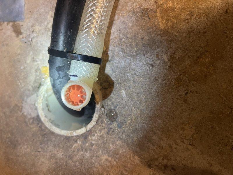 Responded to service call for newly installed furnace (8 days old) that ceased providing heat. Discovered condensate drain blockage caused by a wire nut lodged in the drain fitting, preventing proper drainage. Removed obstruction and verified proper condensate flow, restoring normal furnace operation.