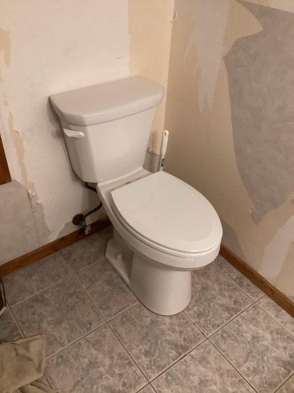 Responded to warranty service call regarding persistent toilet leak after previous internal components replacement. After assessment, determined replacement was necessary rather than further repairs. Installed new standard two-piece toilet to resolve the ongoing leakage issue, ensuring proper connection to existing plumbing and confirming operation before completion.