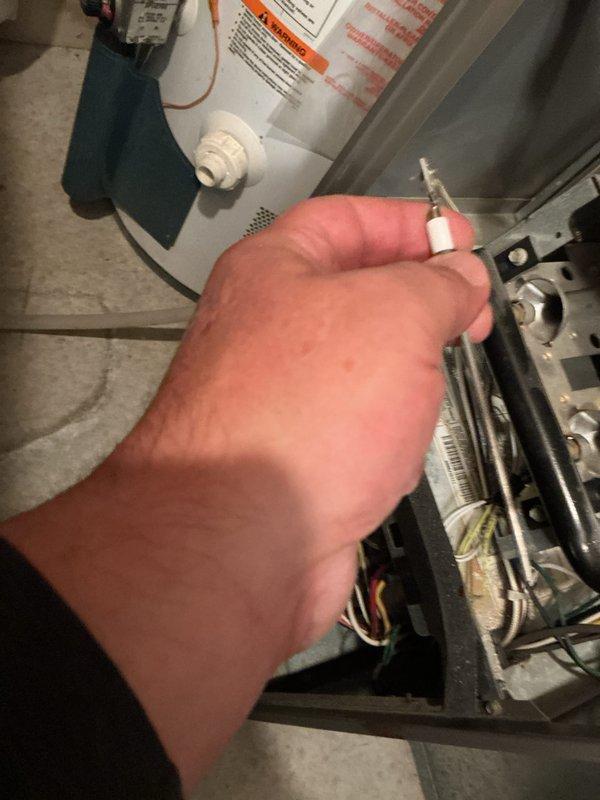 Conducted annual furnace tune-up on a 17-year-old system in 3-sided condo. Inspected electrical connections and control system components. System is functioning properly but at end of useful life; replacement recommended due to age.