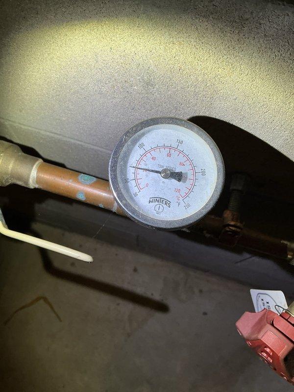 Responded to no heat call for sun room mini boiler system. Diagnosed air lock in the infloor heating loop preventing proper circulation. System requires drain and fill procedure with transfer pump to remove trapped air. Unable to complete repair during initial visit; job rescheduled with additional technician assistance needed.