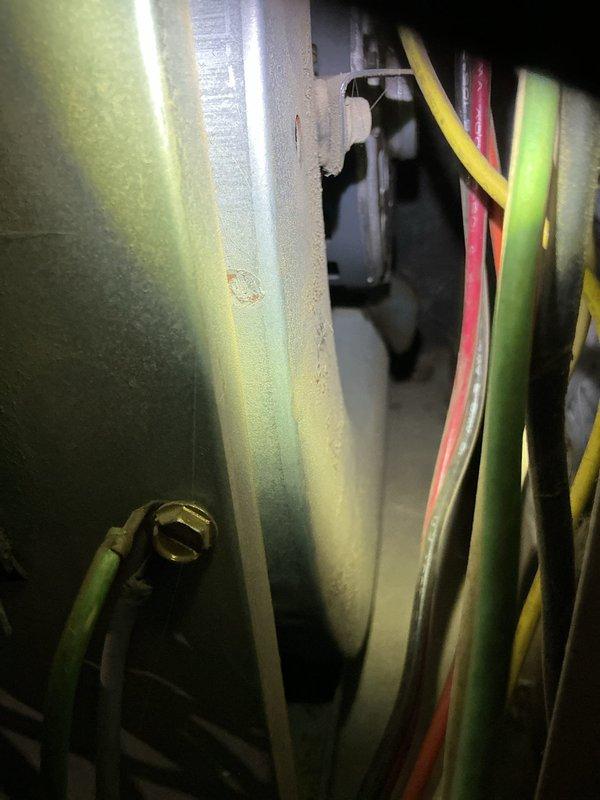 Performed routine maintenance on 27-year-old Goodman 90% efficiency furnace. Inspection revealed cracked heat exchanger inside burners, which was previously replaced approximately 10 years ago. Due to safety concerns with the compromised heat exchanger, recommended complete system replacement.