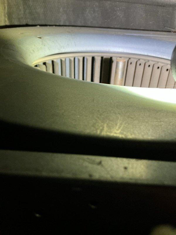 Performed routine maintenance on 27-year-old Goodman 90% efficiency furnace. Inspection revealed cracked heat exchanger inside burners, which was previously replaced approximately 10 years ago. Due to safety concerns with the compromised heat exchanger, recommended complete system replacement.