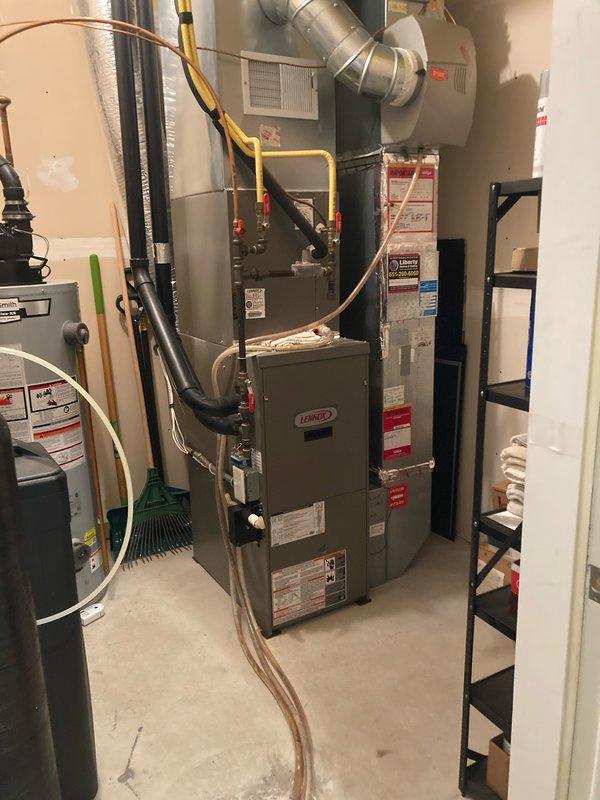 Performed routine maintenance tune-up on a well-maintained 18-year-old Lennox furnace. Inspected all components, checked electrical connections with clamp meter showing readings of 596/29, and replaced filters. Equipment is functioning properly with no immediate repair needs identified.