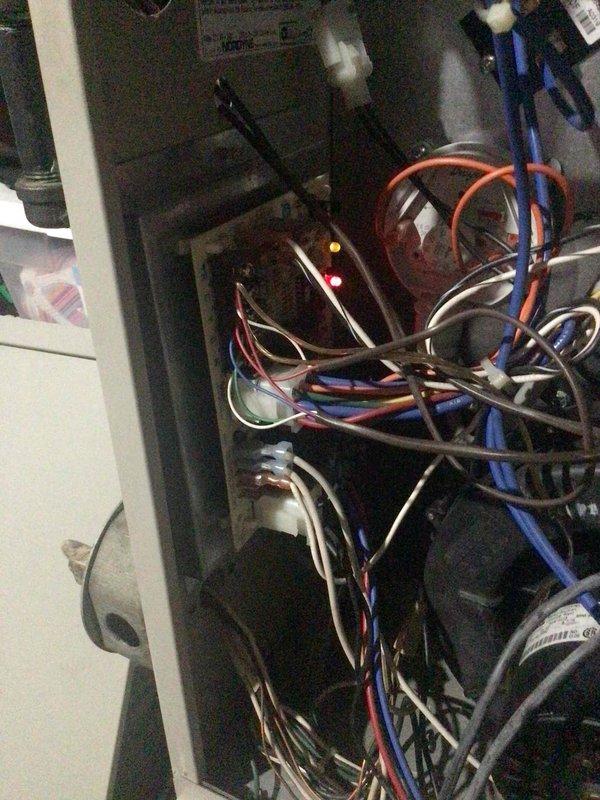 Responded to no-heat call on aging furnace. Diagnosed failed igniter with visible crack upon removal. Replaced igniter successfully restoring heat function. Noted inducer motor showing early failure signs with excessive shaft play - recommended monitoring and future replacement.
