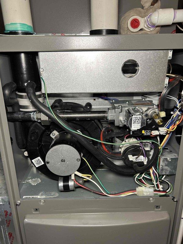 Performed comprehensive tune-up on 3-year-old Lennox furnace. Found filter heavily coated with pet hair; advised homeowner to replace filter every 30 days. Cleaned flame sensor, checked/adjusted low and high stage gas pressure, inspected capacitor function and flame sensor readings. Cleared condensation trap and drainage line to prevent buildup and maintain proper operation. Verified carbon monoxide sensor functionality.