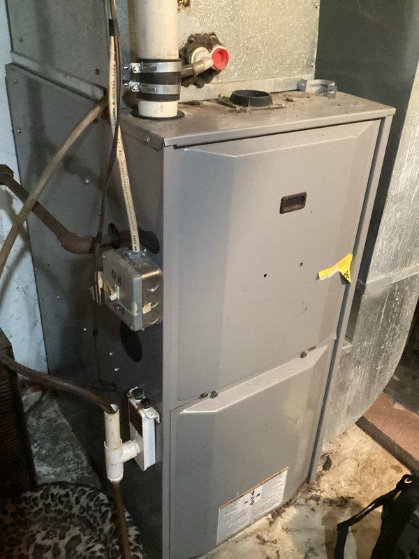 Responded to no heat call for a 20+ year old furnace. Diagnosed complete failure of control board despite proper power supply. Furnace inspection revealed severe dirt accumulation in blower cabinet and secondary heat exchanger. After verifying heat exchanger integrity, installed new control board which successfully restored normal heating function.