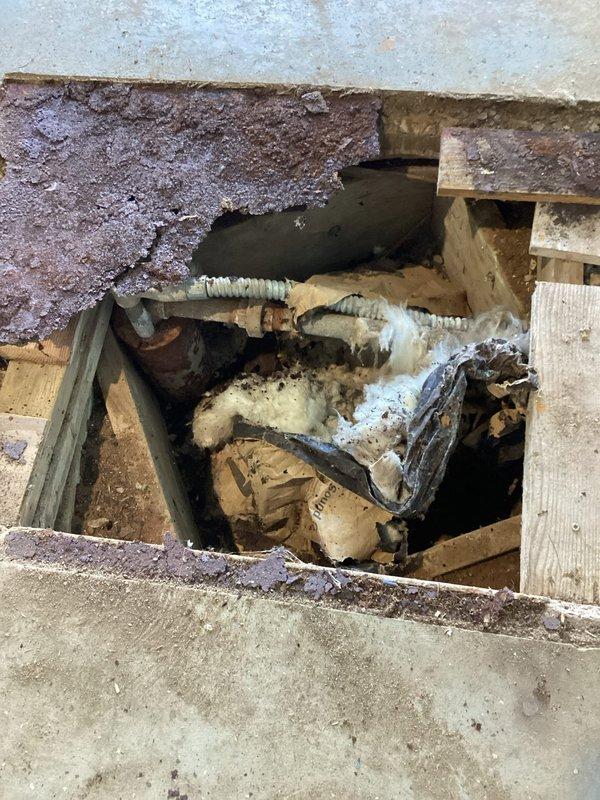 Diagnosed non-functioning water system with pressure switch calling for water but inoperable pump. Inspected aging pressure tank (approximately 80 years old) and discovered significant deterioration in the plumbing infrastructure including damaged insulation and worn components. Customer also experiencing issues with electric in-floor heat boiler; provided professional referrals for well pump replacement and HVAC service.