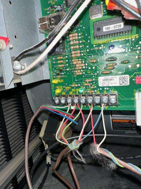 Responded to no heat call for natural gas system of indeterminate age. Diagnostic testing revealed low pressure sensor error on White Rogers control board. Identified failed motor bearing as root cause. Ordered replacement motor with installation scheduled for next day.