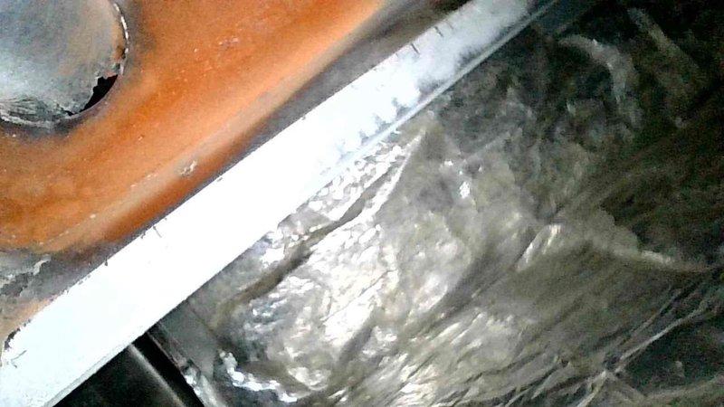 Conducted furnace inspection and identified multiple critical safety issues including cracked heat exchanger, elevated CO levels, and damaged venting system with improper PVC pipe modifications at exhaust. Documented corrosion and deterioration of metal components through visual inspection. Due to extensive safety concerns and compromised system integrity, recommended complete furnace replacement.