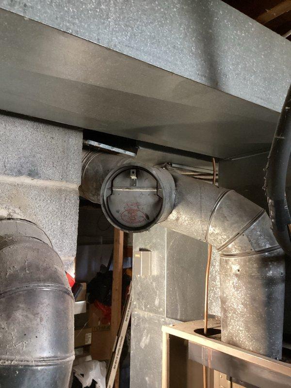 Completed comprehensive tune-up service on customer's oil furnace (8-12, over 10 years old), including replacement of oil filter, gaskets, and nozzle with .65 80°B nozzle. System inspection covered transformer, ignition, control box, wiring, blower, Beckett motor, sensors, electronic air filter, combustion air, and venting; purged air from fuel line and verified normal operation.