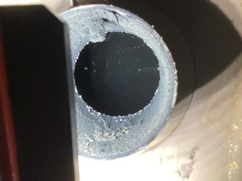 Completed comprehensive tune-up service on customer's oil furnace (8-12, over 10 years old), including replacement of oil filter, gaskets, and nozzle with .65 80°B nozzle. System inspection covered transformer, ignition, control box, wiring, blower, Beckett motor, sensors, electronic air filter, combustion air, and venting; purged air from fuel line and verified normal operation.