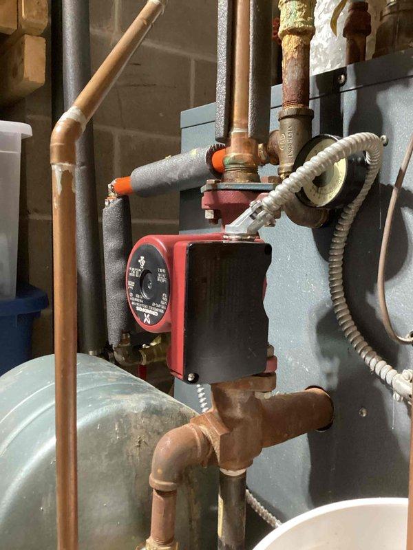 Diagnosed heating system failure in white boiler with no flow to house. Identified multiple issues including a stuck floor control valve, faulty pressure gauge, and possibly malfunctioning ball valve near circulator pump. Replaced pressure/temperature gauge, freed up control valve to restore water flow, and installed relief valve. System was properly pressurized and bled out; however, circulation issues persisted despite pump appearing operational. Recommended expansion tank replacement and auto fill system upgrade from filter trial to conventional configuration. Scheduled follow-up service with boiler specialist for further diagnosis.
