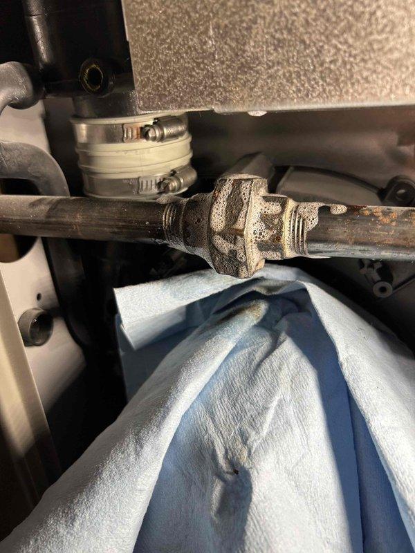 Performed routine maintenance on 2-year-old Lennox natural gas furnace. Identified and repaired small gas leak at the union inside furnace by tightening connection. Completed comprehensive system inspection including all routine components with no additional issues found. Confirmed proper operation after service.