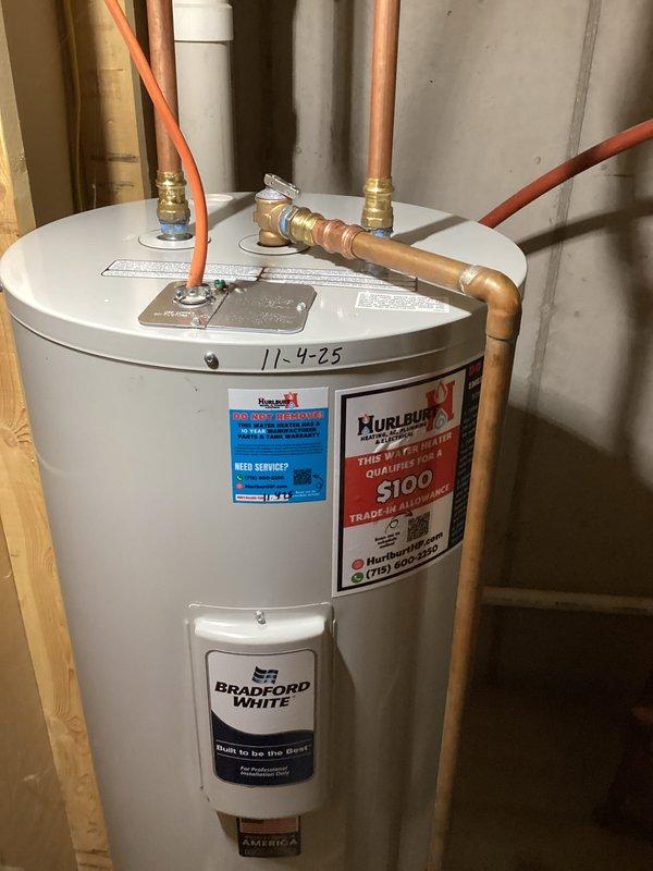 Replaced 2006 model natural gas water heater (50 gallon) that had been tripping circuit breaker and failed to produce hot water. Installed new Bradford White water heater and connected all required plumbing lines with appropriate brass fittings. Customer enrolled in service membership program.