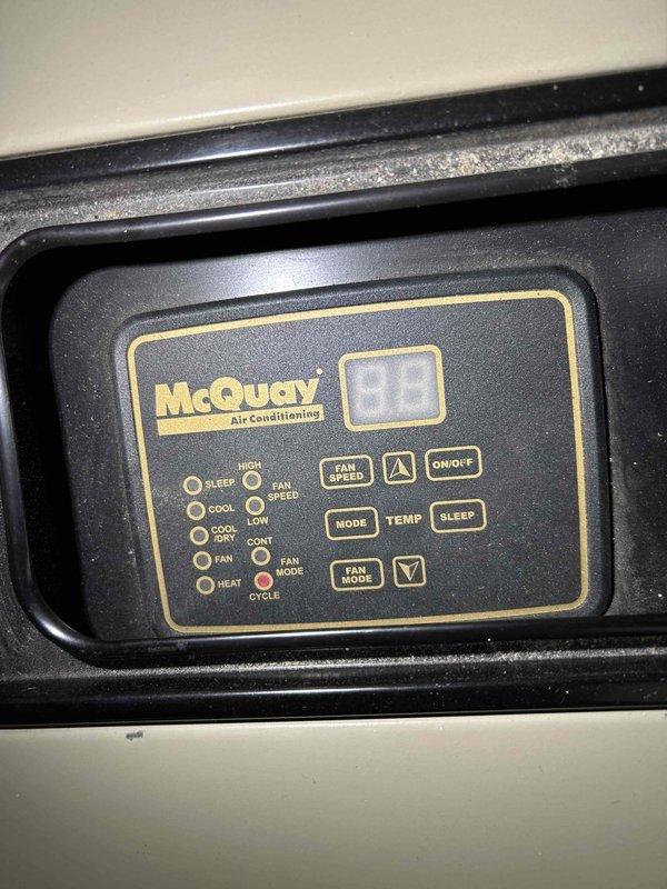 Performed comprehensive tune-up on McQuay heat pump system. Inspected electrical connections and verified proper operation of the unit in heating mode. Cleaned condenser coils and filter, checked for water leaks, and confirmed proper voltage at control box. Noted existing thermostat lacks C-wire required for WiFi thermostat upgrade - would require either new wiring or installation of adapter module. Also inspected electric baseboard heating system, which is functioning normally. Unit is operating within specifications.