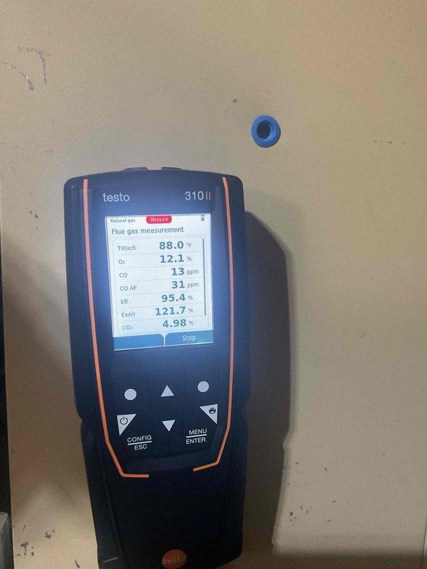 Performed scheduled furnace tune-up on 7-year-old FRP system. Replaced dirty filter and conducted flue gas analysis with Testo 310 II, confirming proper combustion efficiency at 95.4% with acceptable CO levels (13 ppm).