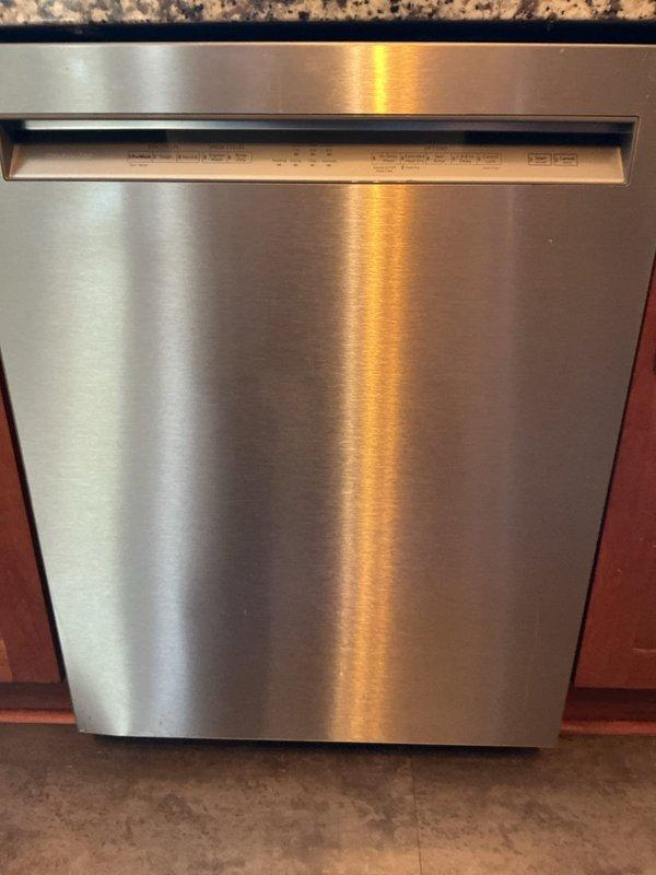 Inspected KitchenAid dishwasher model KDS104 that was filling with water but not operating. Upon examination, determined the unit likely has a faulty water pump rather than a water pressure issue. Advised customer that appliance repair specialist is required as this falls outside standard plumbing service scope.