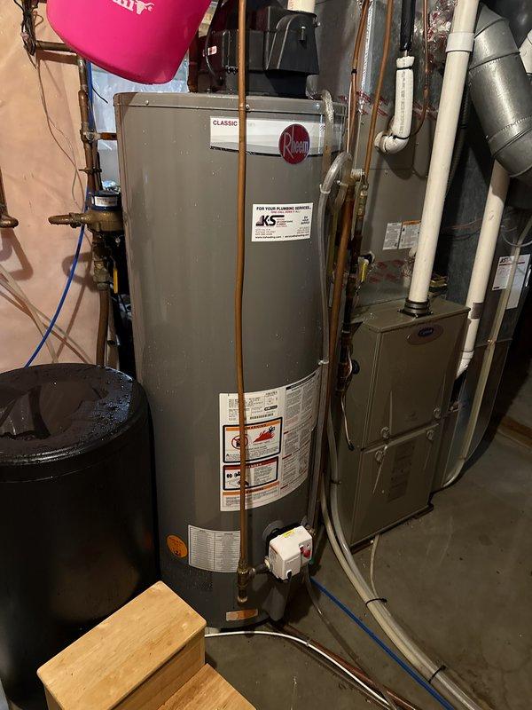 Diagnosed water leak from humidifier shut off assembly caused by damaged compression fitting, adapter, and a stuck open valve. Cut out damaged section of tubing, installed new adapter and compression fitting to stop the leak. Verified proper furnace operation and confirmed humidifier is now functioning correctly.