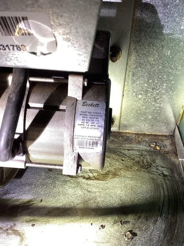 Performed maintenance tune-up on Williamson oil furnace. Removed bat from burner tube, replaced oil nozzle, tank filter, and air filter. Adjusted air mixture which was set too high causing lean burning. Noted minor bearing noise in Beckett burner motor which will need replacement - estimate provided to customer. Unit now operating properly.