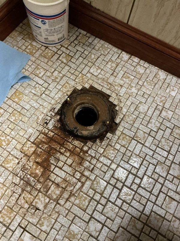 Completed toilet replacement due to rusted floor drain and significant water damage in bathroom. Installed new standard height toilet with wax ring and mounting hardware. Addressed plumbing system issues by replacing deteriorated main gate valves and installing pressure reducing valve (PRV) to correct high water pressure condition.