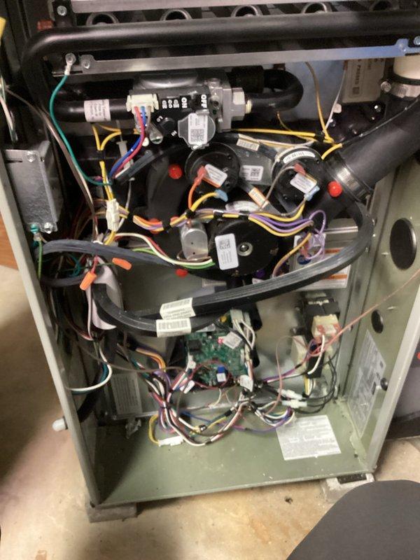 Performed comprehensive tune-up on high efficiency Trane furnace including combustion analysis using Testo analyzer, which confirmed safe operation parameters. Inspected electrical connections and verified they remain solid. Replaced humidifier panel, cleaned flame sensor, and verified adequate filter condition. System is functioning properly and ready for continued operation.